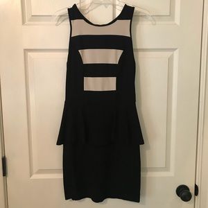 Cream and black color block peplum dress